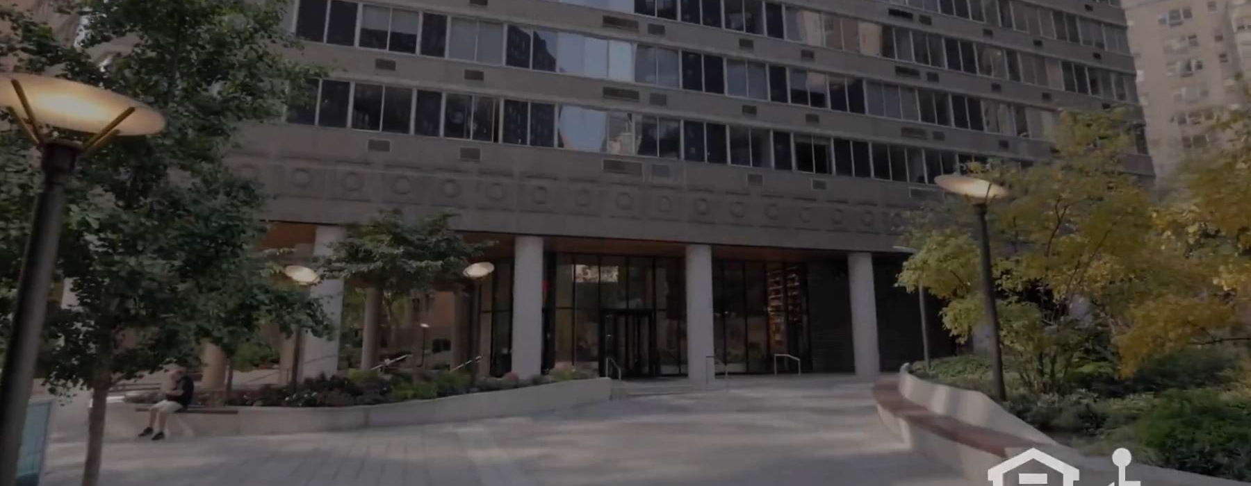 a large building with trees