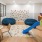 a room with a slide and chairs