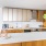 a kitchen with white cabinets