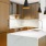 a kitchen with a sink and a counter top